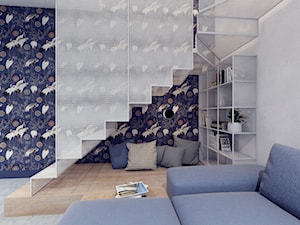 Salon / schody - styl nowoczesny - minimalizm, granat, biel i ażur - zdjęcie od NIÑAS New Interior Architecture Studio