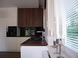 Małe mieszkanko w męskim stylu - Kuchnia, styl minimalistyczny - zdjęcie od eldevision