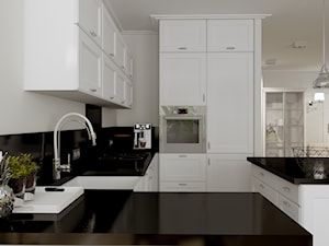 Domek w Darłowie - Średnia otwarta biała z zabudowaną lodówką z nablatowym zlewozmywakiem kuchnia w kształcie litery u z wyspą lub półwyspem, styl nowoczesny - zdjęcie od AS studio