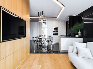 Apartament Gdańsk Jelitkowo - Mały biały czarny salon z kuchnią z jadalnią, styl nowoczesny - zdjęcie od Kowalczyk Gajda Studio Projektowe