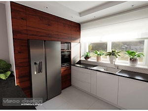 Słoneczna kuchnia. - Średnia otwarta biała z zabudowaną lodówką z podblatowym zlewozmywakiem kuchnia w kształcie litery l z wyspą lub półwyspem z oknem, styl nowoczesny - zdjęcie od Visoo Design