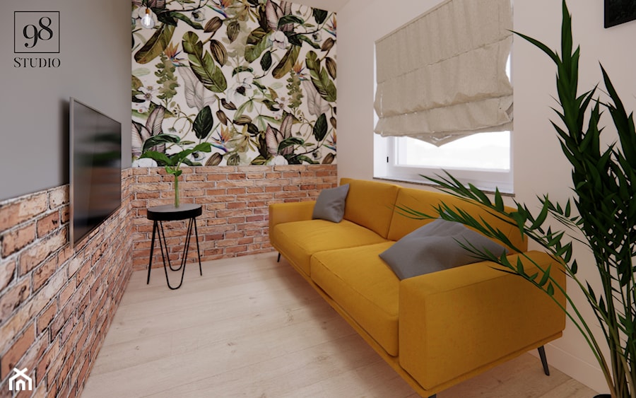 Salon w apartamencie z żółtą sofą - zdjęcie od studio98
