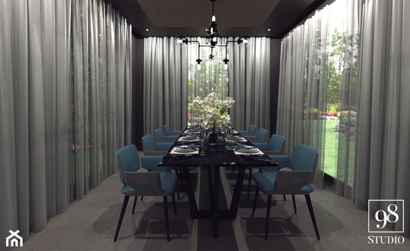 Duża przeszklona jadalnia w nowoczesnym domu z akcentem niebieskiego - zdjęcie od studio98