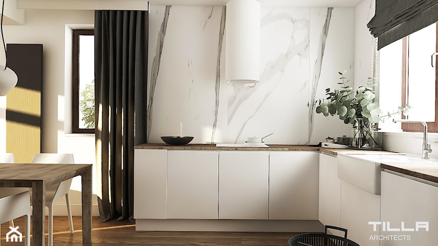 Mała otwarta biała z zabudowaną lodówką z nablatowym zlewozmywakiem kuchnia w kształcie litery l z oknem z marmurem nad blatem kuchennym, styl nowoczesny - zdjęcie od TILLA architects