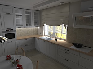 Dom jednorodzinny pod Kaliszem - Duża biała z zabudowaną lodówką z podblatowym zlewozmywakiem kuchnia w kształcie litery l z oknem, styl tradycyjny - zdjęcie od MATO projekt