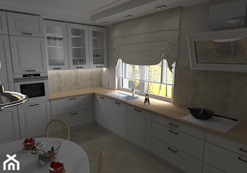 Dom jednorodzinny pod Kaliszem - Duża biała z zabudowaną lodówką z podblatowym zlewozmywakiem kuchn ... - zdjęcie od MATO projekt