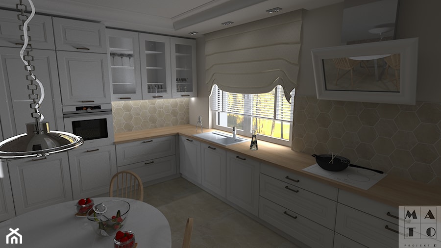 Dom jednorodzinny pod Kaliszem - Duża biała z zabudowaną lodówką z podblatowym zlewozmywakiem kuchnia w kształcie litery l z oknem, styl tradycyjny - zdjęcie od MATO projekt