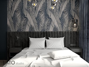 Sypialnia z liściastą tapetą