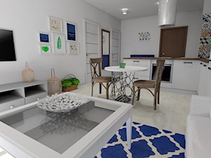 Mieszkanie z nutą orientu - Mały biały salon z kuchnią z jadalnią - zdjęcie od Pracownia Aranżacji Wnętrz "O-kreślarnia"