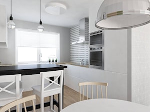 Dom na wakacje - Mały biały salon z kuchnią z jadalnią - zdjęcie od Pracownia Aranżacji Wnętrz "O-kreślarnia"