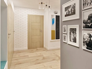 Mieszkanie z pozytywną energią - Średni biały szary hol / przedpokój - zdjęcie od Pracownia Aranżacji Wnętrz "O-kreślarnia"