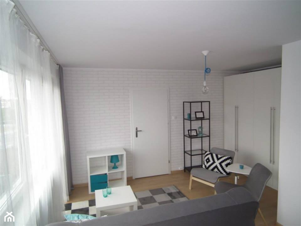 Nowoczesne, biało-szare mieszkanie - Mały biały salon - zdjęcie od Pracownia Aranżacji Wnętrz "O-kreślarnia" - Homebook