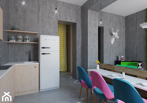 Oryginalne mieszkanie z betonem i sklejką - Średnia szara jadalnia w salonie w kuchni - zdjęcie od Pracownia Aranżacji Wnętrz "O-kreślarnia"