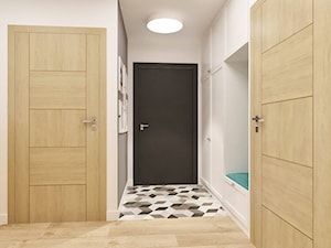 Mieszkanie z pozytywną energią - Średni biały szary hol / przedpokój - zdjęcie od Pracownia Aranżacji Wnętrz "O-kreślarnia"