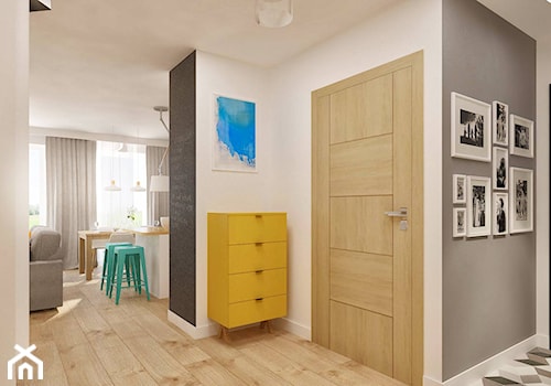 Mieszkanie z pozytywną energią - Mały biały szary hol / przedpokój - zdjęcie od Pracownia Aranżacji Wnętrz "O-kreślarnia"