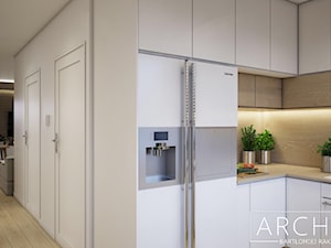 Mieszkanie Wielkopolska - Mała otwarta biała z zabudowaną lodówką kuchnia w kształcie litery u, styl nowoczesny - zdjęcie od ArchiVR Bartlomiej Rakowski