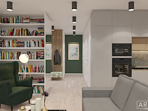 Mieszkanie Sieradz II - Mały biały salon z kuchnią z bibiloteczką, styl nowoczesny - zdjęcie od ArchiVR Bartlomiej Rakowski