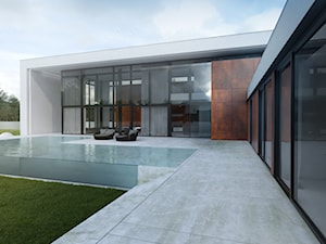 Widok domu od części basenowej - zdjęcie od BIAMS Budownictwo i Architektura Marcin Sieradzki - projektant, architekt