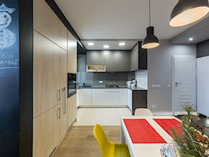 kuchnia w apartamencie - zdjęcie od BIAMS Budownictwo i Architektura Marcin Sieradzki - projektant, architekt