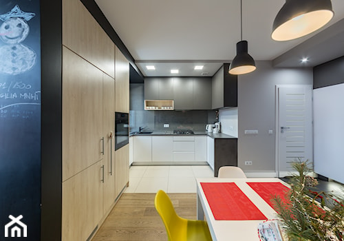 kuchnia w apartamencie - zdjęcie od BIAMS Budownictwo i Architektura Marcin Sieradzki - projektant, architekt
