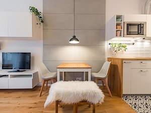 Apartament w Wilanowie - Średni szary salon z kuchnią z jadalnią, styl skandynawski - zdjęcie od Fotownętrza