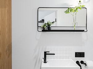 Mieszkanie 60 m² na Mokotowie - Mała bez okna z lustrem łazienka, styl minimalistyczny - zdjęcie od Fuga Architektura Wnętrz