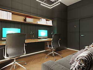 Wnętrza - Średnie w osobnym pomieszczeniu z sofą z zabudowanym biurkiem czarne biuro - zdjęcie od Marquardt Design