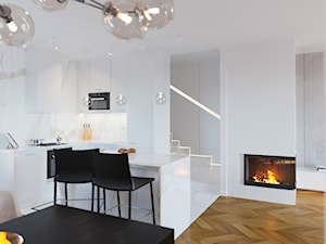 Wnętrza - Średnia otwarta z salonem biała z zabudowaną lodówką z podblatowym zlewozmywakiem kuchnia w kształcie litery l - zdjęcie od Marquardt Design