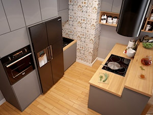 Wnętrza - Średnia otwarta szara z zabudowaną lodówką z nablatowym zlewozmywakiem kuchnia dwurzędowa - zdjęcie od Marquardt Design