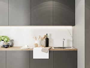 Minimal Green - Mała zamknięta szara z nablatowym zlewozmywakiem kuchnia jednorzędowa z marmurem nad blatem kuchennym, styl minimalistyczny - zdjęcie od LINEUP STUDIO