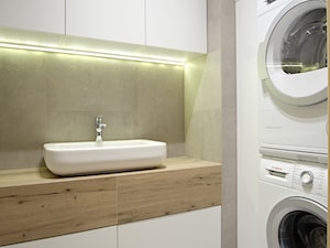 Praktyczna pralnia w stylu minimalistycznym - zdjęcie od Inside Projekty Wnętrz. Małgorzata Więch