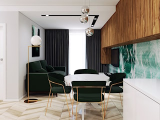 Ultra nowoczesny salon z zielonym akcentem 