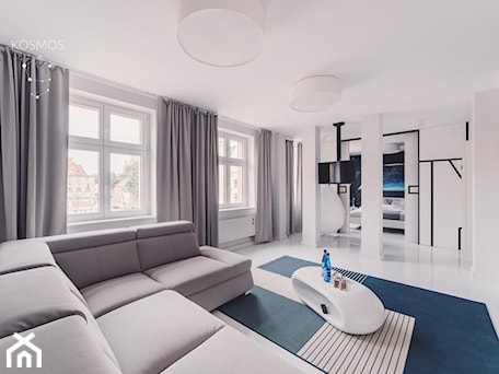 Aranżacje wnętrz - Salon: APARTAMENT NA WYNAJEM - Duży biały salon - START DESIGN. Przeglądaj, dodawaj i zapisuj najlepsze zdjęcia, pomysły i inspiracje designerskie. W bazie mamy już prawie milion fotografii!