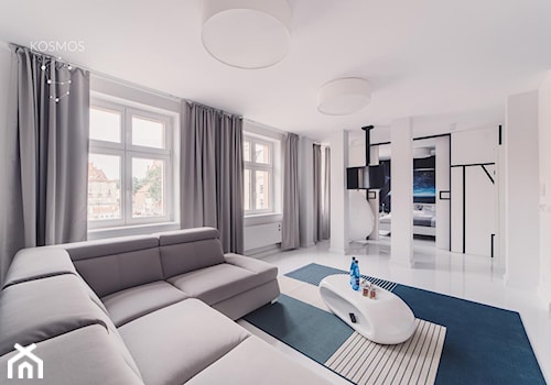 APARTAMENT NA WYNAJEM - Duży biały salon - zdjęcie od START DESIGN