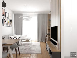 Białe Bielany - Średni biały salon z jadalnią, styl skandynawski - zdjęcie od MOOKA Studio