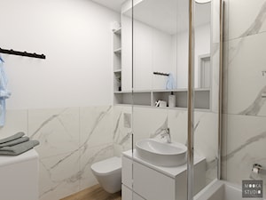 Wnętrze inspirowane naturą - Mała bez okna z pralką / suszarką z lustrem łazienka, styl skandynawski - zdjęcie od MOOKA Studio