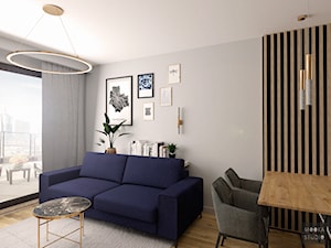 Mieszkanie na Woli - Mały szary salon z jadalnią, styl skandynawski - zdjęcie od MOOKA Studio