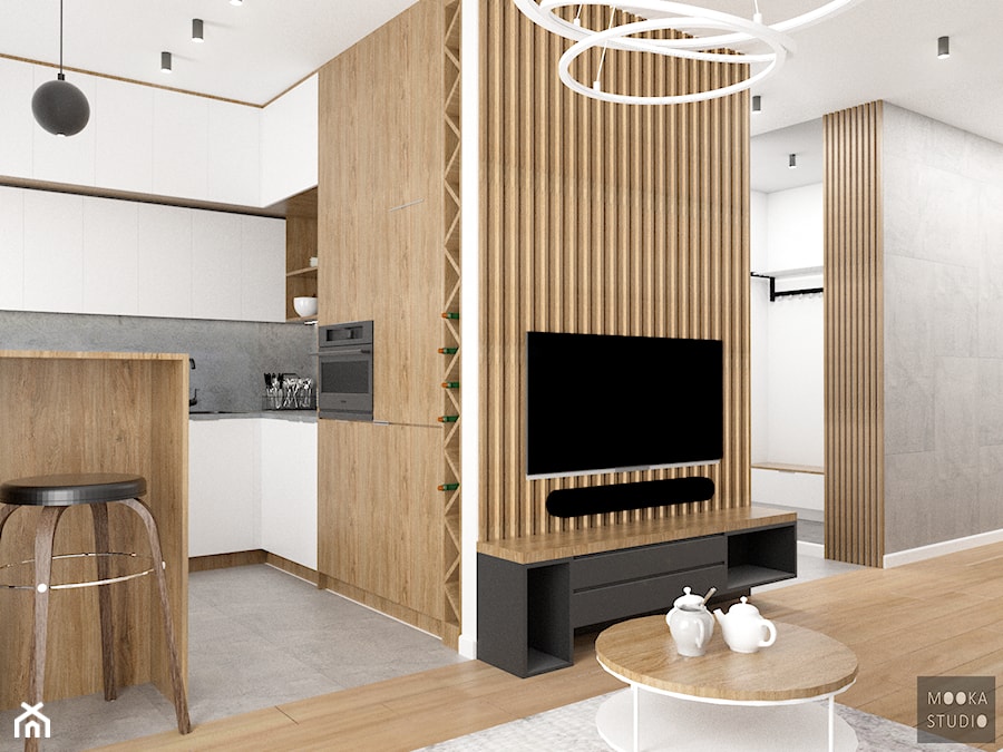 Białe Bielany - Mała otwarta z salonem szara z zabudowaną lodówką z nablatowym zlewozmywakiem kuchnia w kształcie litery g, styl skandynawski - zdjęcie od MOOKA Studio