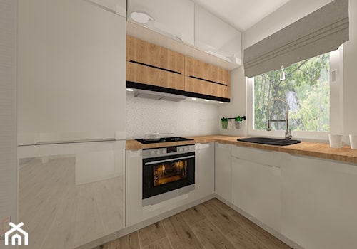 Salon z kuchnią w domu jednorodzinnym - Średnia otwarta z salonem szara z zabudowaną lodówką z nablatowym zlewozmywakiem kuchnia w kształcie litery l z oknem - zdjęcie od QL Home