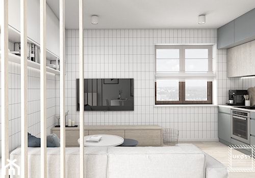 MIESZKANIE 40m2 - Mały szary salon z kuchnią, styl minimalistyczny - zdjęcie od UKOSY studio