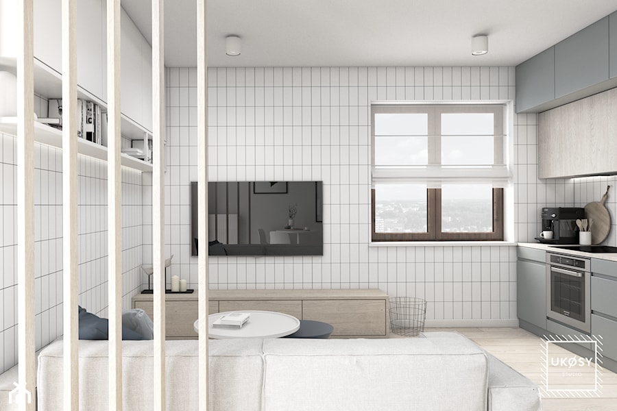 MIESZKANIE 40m2 - Mały szary salon z kuchnią, styl minimalistyczny - zdjęcie od UKOSY studio