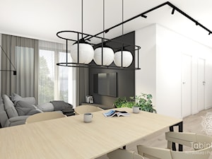 Nowoczesne mieszkanie - Mały biały czarny szary salon z jadalnią, styl skandynawski - zdjęcie od Tabin Design
