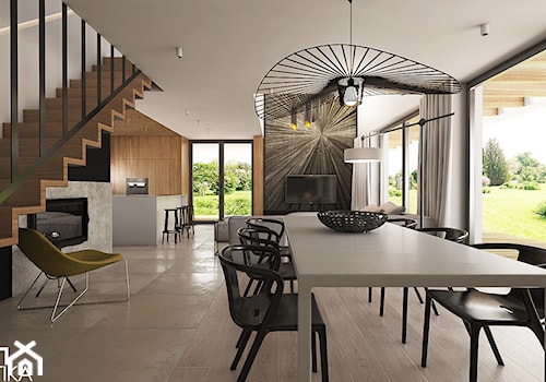 Projekt wnętrza domu jednorodzinnego w Chrzanowie, 180 m2 - Średni czarny szary salon z kuchnią z jadalnią z tarasem / balkonem z barkiem, styl minimalistyczny - zdjęcie od TIKA DESIGN