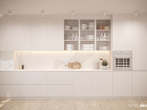 Jasny salon z otwartą kuchnią - zdjęcie od Smart Design