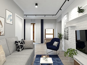mały salon z biała cegła - zdjęcie od SenkoArt Design