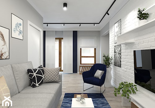 mały salon z biała cegła - zdjęcie od SenkoArt Design