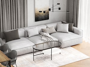 Jasny salon z szeroką i wygodną kanapą - zdjęcie od Senkoart Design