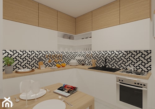 Projekt wnętrz mieszkania przy ul. Puławskiej - Średnia otwarta biała czarna z zabudowaną lodówką kuchnia w kształcie litery l, styl nowoczesny - zdjęcie od PROJEKTOWNIA Małgorzata Woldańska