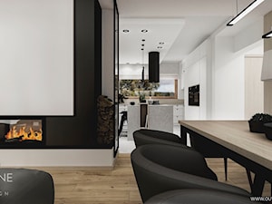 Dom jednorodzinny w stylu nowoczesnym 2 - Średni biały czarny salon z kuchnią z jadalnią, styl nowoczesny - zdjęcie od Outline of Design