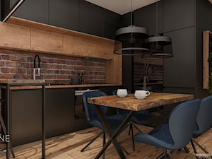 Mieszkanie w stylu nowoczesnym - Średnia otwarta czarna z zabudowaną lodówką kuchnia w kształcie litery l, styl nowoczesny - zdjęcie od Outline of Design